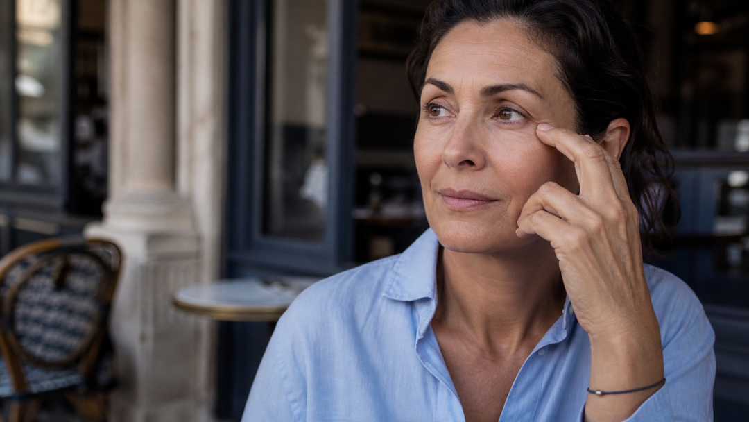 A woman over 40 with a calm, natural-looking eye area